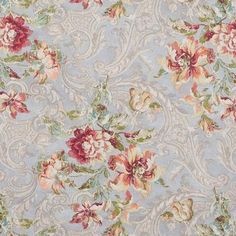 a blue floral wallpaper with red and pink flowers on it's side,