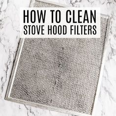 how to clean stove hood filters on a marble counter top with text overlay that reads, how to clean stove hood filters