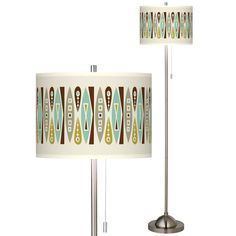 two lamps are next to each other on a white background with brown and blue designs