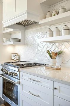 White Backsplashes Kitchen, Cloe Tile Herringbone Backsplash, Tile Ideas For Kitchen Backsplash, Slide In Range Backsplash Ideas, White Subway Tile Herringbone Backsplash, Herringbone Kitchen Tiles, Backsplash To Ceiling Kitchen, 3x12 Herringbone Backsplash, Backsplash Ideas With Granite Countertop