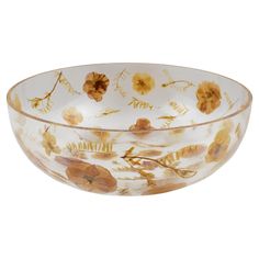 a glass bowl with flowers painted on it