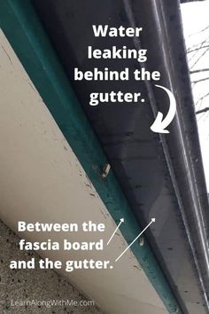 an image of water leaking behind the gutter between the fascia board and the gutter