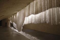 ice hanging from the ceiling in an empty building