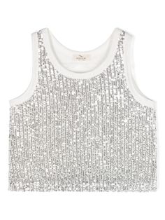 white/silver-tone sequin embellishment round neck sleeveless full lining cropped We've partnered with Good On You — an independent agency that rates how brands perform in relation to their impact on the planet, people and animals, with a multi-criteria rating simplified to a five points scale. In order to be awarded our conscious label, larger brands need to score a minimum of four out of five ('Good'), while smaller brands must score at least three out of five ('It's A Start'). Sparkly Crop Tops, Crop Tshirt, Girl Top, White Silver, White Shirt, Girls Tshirts, Organic Cotton, Girl Outfits, Crop Tops