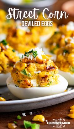 deviled eggs stuffed with corn and cheese on a plate