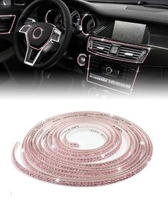 the interior of a car is decorated with pink beads