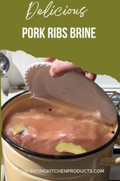 a person scooping some food into a pot with the words delicious pork ribs brine