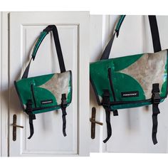 two bags hanging on the side of a door