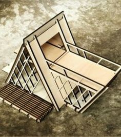 an architectural model of a house on concrete