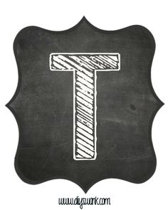 a chalkboard with the letter t drawn on it