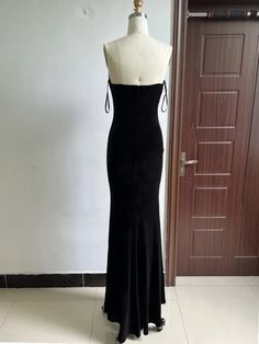 Add a touch of elegance and allure to your style with our FZ Women's Sexy Off the Shoulder Bow Diamond Chain Velvet Evening Dress. Crafted with a luxurious velvet fabric, this dress features a flattering off-the-shoulder design and a dainty bow with a diamond chain accent. Perfect for making a statement at any evening event. Elasticity: Non Stretch Sleeve Style: Strapless Fabric Type: Denim Pattern Type: Solid Fit Type: Slim Silhouette: Sheath Neckline: Strapless Decoration: Beading Style: Sexy & Club Dresses Length: Ankle-Length Material: POLYESTER Material: SPANDEX Material: Velvet Closure Type: zipper Type: regular Material Composition: synthetic fiber Waistline: Natural Sleeve Length(cm): Full Gender: WOMEN Elegant Black Corset Dress For Party, Black Evening Bodycon Dress For Prom, Elegant Backless Corset Dress For Evening, Evening Prom Black Bodycon Dress, Glamorous Black Evening Dress With Corset Back, Elegant Black Corset Dress For Evening, Elegant Corset Back Dress For Club, Elegant Corset Dress For Club With Corset Back, Elegant Black Corset Dress With Boning