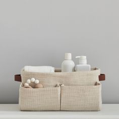 the linen storage bag is filled with personal care items