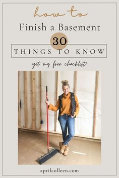 a woman standing on the floor with a broom in her hand and text overlay that reads how to finish a basement 30 things to know