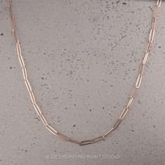 14k Rose Gold Elongated Link Necklace This 14k rose gold dainty and timeless 18" elongated link chain necklace drapes beautifully over the collarbone. A wonderful stacking piece to add dimension to your look! Measuring 2.6 mm wide with a lobster clasp style closure. Necklace specs; The necklace is a 18" long chain 2.6 mm wide Necklace comes packaged and ready for gift giving. Shipping: Please allow 3-5 business days for processing. You will be notified when the item ships and will be provided tr Rose Gold Chain Necklace With Delicate Rectangular Links, Classic Rose Gold Chain Necklace With Rectangular Links, Rose Gold Chain Necklace With Rectangular Links, Elegant Gold-tone Rectangular Chain Necklace, Gold-tone Solid Link Chain Necklace, Cable Chain Necklace, Link Chain Necklace, Necklace Online, Handcrafted Necklace