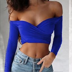 Blue Off Shoulder Sexy Crop Top . Stretchy Material Can Fit A Body Frame From Size Medium Up To Size Xtra Large . Blue Fitted Flirty Top, Blue Flirty Fitted Tops, Trendy Low-cut Crop Top For Club, Blue Tops For Spring Club Season, Blue Tops For Club And Spring Season, Blue Club Tops For Spring, Blue Crop Top For Club In Spring, Blue Crop Top For Club And Spring Season, Blue Stretch Crop Top For Club