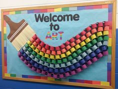 a welcome to art sign made out of construction paper