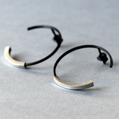 Large sterling silver hoop earrings, made of oxidized matte black silver. They are light and comfortable. They are good for any ocassion and fits most of outfits. If you like simple geometric forms in jewelry, they are perfect choice for you. Diameter: 30 mm Enjoy colorful world of Shambala A few words about our works: All of the products in gallery are designed by us. Our studio is located in the beautiful seaside city of Gdańsk at Świętokrzyska Street. Everything is 100% handmade, with special Seaside City, Modernist Earrings, Punk Earrings, Colorful World, Big Hoop Earrings, Open Hoop Earrings, Earrings Geometric, Men Earrings, Sterling Silver Hoop Earrings