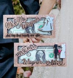 the bride and groom are holding up their money for the wedding ceremony, which was made out of dollar bills