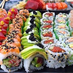 sushi platter with many different types of sushi