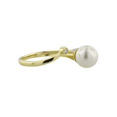 Introducing our 14K Cultured Pearl Bypass Ring – an elegant fusion of timeless charm and exceptional craftsmanship. Elegant Yellow Gold Engraved Ring With Diamond Accents, Elegant Engraved Yellow Gold Ring With Diamond Accents, 14k Gold Pearl Ring With Polished Finish, Elegant 14k Gold Engraved Ring, Refined Gold Solitaire Ring, Classic 14k Gold Diamond Ring With Open Band, Elegant Engraved Open Ring, Fine Jewelry Pearl Ring With Polished Open Ring, Fine Jewelry Pearl Ring With Polished Finish