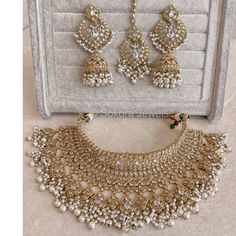 Flexible antique gold necklace set made up of clear zircon crystals and small ivory pearl beads. Necklace comes complete with matching tikka, and earrings. Necklace is adjustable to fit any size.  Ready to ship as seen with gift box. Gold Bridal Jewellery, Bridal Survival Kit, Pearl Beads Necklace, Antique Gold Necklace, Bridal Jewellery Set, Bangle Box, Indian Bridal Jewelry Sets, Bridal Choker, Gold Bridal Jewellery Sets