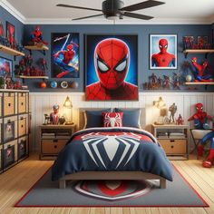 a bedroom decorated in blue and red with spiderman pictures on the wall