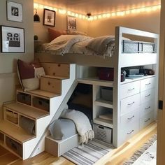 a loft bed with stairs leading up to the top bunk and storage drawers underneath it