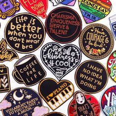 many different types of patches with words on them in various shapes and sizes, including hearts