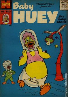 an old comic book with a cartoon character on the cover and baby huey in the background