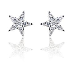 Diamond Ring  A stunning pair of handcrafted illusion set diamond star earrings. The earrings have a look of one big diamond star on each ear. A large backing provides extra pledge and comfort by keeping the earrings straight on the lobe.  SHOP ONLINE Visit @ http://www.delicategem.com or give us a call @ (212) 354-7449 - we’re here to help.  OR stop by our NYC showroom Address @ 64 West 47th street #F18 New York NY 10036. Diamond Star Earrings, Minions Quotes, Big Diamond, Diamond Star, Star Earrings, Diamond Clarity, Diamond Studs, Jewelry Earrings Studs, Colored Diamonds