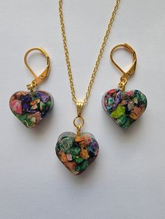 Heart Shaped Multi Colored Stone resin Earrings with matching necklace. Resin Heart Charm Pendant Jewelry, Multicolor Resin Dangle Jewelry, Multicolor Dangle Jewelry For Valentine's Day, Valentine's Day Multicolor Pendant Jewelry, Heart Beads Resin Jewelry Gift, Handmade Heart-shaped Resin Jewelry, Multicolor Resin Pendant Jewelry, Multicolor Resin Jewelry Gift, Multicolor Resin Jewelry For Gift