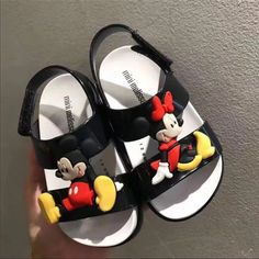 Brand New Minnie-Mickey Toddlers Cosmic Jelly Sandals Size 9 Your Little Ones Can Step Out In Style With This Cute Shoe Great Shoe For Summer & Vacation Perfect Gift For Your Friends & Love Ones.!!! Also Available In Size 12 Note: This Shoe Runs In Small Sizes, You Might Need A Size Up For Perfect Fit Disney Open Toe Sandals For Summer, Fun Black Synthetic Sandals, Playful Black Non-slip Sandals, Playful Non-slip Black Sandals, Fun Black Sandals With Round Toe, Disney Summer Sandals With Round Toe, Black Round Toe Sandals With Fun Style, Disney Round Toe Sandals For Summer, Disney Round Toe Summer Sandals