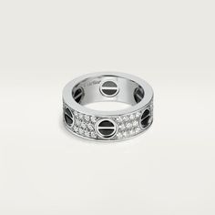 Cartier - Love ring, diamond-paved, ceramic - Ring White gold/Ceramic/Diamond - Love ring, 18K white gold, black ceramic, set with 66 brilliant-cut diamonds totaling 0.74 carats. Width: 6.5mm. Cartier Love Ring, Hip Hop Rings, Gold Ceramic, Ring White Gold, Ceramic Rings, Ceramic Set, Cartier Love, Unisex Ring, Timeless Jewelry