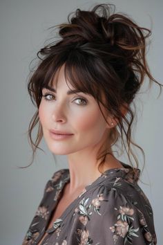 A messy bun situated atop the crown, complemented by wispy bangs, provides a relaxed yet stylish look. An effortlessly chic option for 40-year-old women. Click below to see more! Long Sleek Hair, Messy Updo, Up Dos For Medium Hair, Hair Crush, Sleek Hairstyles, Hairstyles For Women, Messy Hairstyles