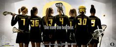 a group of girls in lacrosse uniforms standing next to each other