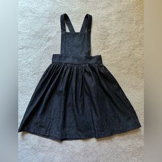 Charcoal/Black Denim Apron Pinafore Dress Great For Fall And Winter Wardrobe, Loose Enough To Layer Over A Fitted Sweater. Would Be Cute With A Peter Pan Collar Button Down. Shoulder Straps Crisscross In The Back And Are Adjustable In Length Using A Ooden Buttons. The Back Features An Elastic Waist 100% Cotton Casual Black Cotton Pinafore Dress, Black Cotton Pinafore Dress For Spring, Black Cotton Denim Dress With Pockets, Casual Fitted Black Pinafore Dress, Apron Pinafore, Denim Apron, Pinafore Dress, Charcoal Black, Sewing For Beginners