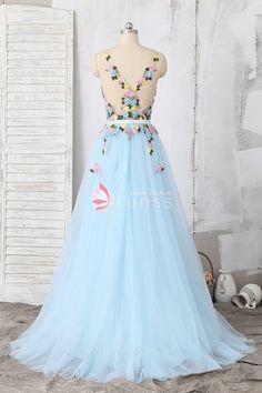 Blue Tulle Ball Gown For Homecoming, Light Blue Tulle Gown For Quinceanera, Light Blue Tulle Ball Gown For Prom, Blue Tulle Gown With Sheer Bodice, Sheer Back Tulle Gown For Prom, Prom Gown With Sheer Back In Tulle, Tulle Gown With Sheer Back For Prom, Light Blue Tulle Prom Gown, Blue Ball Gown With Sheer Bodice For Prom