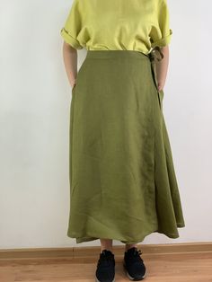 "Handmade olive color linen long wrap skirt with pockets, perfect for casual wear and suitable for any occasion in any season Details: - 100% natural linen produced in Europe ; - medium weight (180 gram per square meter); - color: could be any from our colors catalog (color samples at the photo); Made to order, approximately a few days, If you have any questions please message me and I will be glad to answer. Size guide : Size XS Bust: fits bust around 33\"-34\"/ 84-88 cm Waist: fits waist aroun Summer Long Wrap Skirt With Pockets, Spring Wrap Skirt, Summer Wide Leg Linen Wrap Skirt, Summer Linen Wide Leg Wrap Skirt, Green Linen Skirt For Summer, Green Linen Maxi Skirt For Summer, Summer Green Linen Skirt, Summer Green Linen Maxi Skirt, Summer Linen Green Skirt