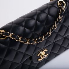 This luxurious 2.55 Classic Flap bag is quilted in lambskin leather with gold toned hardware and signature double chain. This bag is a timeless must have for every woman. Style for any occasion or event - the versatility of black and the iconic nature of this bag will guide your look.   SPL  Exterior  Quilted lambskin leather in Black Gold-tone hardware Turnlock closure Signature CC Clasp Slit pocket at rear of bag Very good condition - small scuff on the back Serial code - 11XXXXXX - 2006/8 production  Interior  Red leather lining  ‘Chanel’ and ‘Made in France’ stamps embossed in leather Slip pocket  Zip compartment on outer flap  Popper closure on inner flap Main compartment with two pockets at interior wall Very good condition – some small signs of wear Serial code - 11XXXXXX - 2006/8 p Classic Flap Bag, Woman Style, Double Chain, Interior Wall, Small Signs, Classic Flap, Exclusive Bag, Flap Bag, Leather Slip Ons