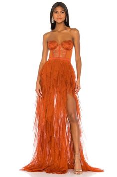 Women's For Love & Lemons X Revolve Bustier Gown - Orange - Gowns For Love & Lemons X REVOLVE Bustier Gown in Rust - Rust. Size L (also in M, S, XS). Self: 100% polyContrast 1: 100% nylonContrast 2: 95% poly 5% spandexContrast 3: 92% silk 8% spandexLining: 82% nylon 18% spandex. Dry clean only. Attached bodysuit lining with bottom snap button closure. Hidden back zipper closure. Boned bodice with underwire cups. Tiered ruffle tulle hem. Neckline to shortest hem measures approx 23 and to longest X Revolve Bustier Gown, Revolve Bustier Gown, Bustier Gown, Orange Gown, Top In Pizzo, Lemon Dress, Tulle Prom Dress, For Love & Lemons, Prom Dresses Lace