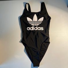 *New* Womens Black Adidas Swimsuit Fitted Black Bodysuit For Poolside, Summer Black Sports Bodysuit, Black Sports Bodysuit For Summer, Black Sports Bodysuit For Spring, Black Bodysuit For Sports In Spring, Black Beachwear Bodysuit For Spring, Spring Sports Black Bodysuit, Black Spring Sports Bodysuit, Trendy Black Bodysuit For Sports