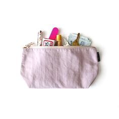 Our 'Small Everything Pouch' is crafted from repurposed scrap fabric. It's the perfect pouch to beat all that bottom-of-the-tote-clutter. It’s just the right size for make-up, kid supplies, wallet essentials and much more. When not in use it packs away for compact storage. Product Details: 9.75"x5.5"x2.25" Water resistant & easily wipeable fabric making clean up an ease Designed with love in Savannah, Georgia Imported Casual Pink Cosmetic Bag, Casual Pink Cosmetic Bag For Everyday, Pink Casual Cosmetic Bag For Everyday Use, Everyday Cotton Pencil Case With Zipper, Versatile Everyday Pouch With Pockets, Casual Pouch Pencil Case For Everyday Use, Versatile Pink Cosmetic Bag, Versatile Pink Cosmetic Bag For Everyday, Versatile Everyday Pink Cosmetic Bag