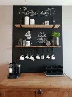 the coffee bar is decorated with chalk and wooden shelves