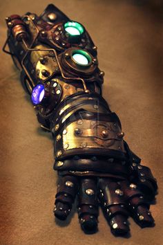 Steampunk mechanical gauntlet/glove. Steampunk gauntlet This listing is for one custom robot style gauntlet. Each one made is unique.  If you have any design ideas, reference shots or sketches, Feel free to let me know. I will try my hardest to incorporate them into the piece. Hand crafted in Sooke, BC Canada by Ian Finch-Field of Skinznhydez Please leave these specs in the "message to seller" box while checking out. Or message me one checkout is complete. Left or right arm? =  wrist size (circu Steampunk Kunst, Steampunk Gloves, Steampunk Armor, Steampunk Robot, Steampunk Gadgets, Mode Steampunk, Art Steampunk, Style Steampunk, Steampunk Cosplay