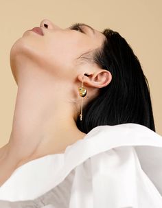 Presented in sterling silver, brass, or resin, Naida is accentuated with a signature blob, and tipped with a mini droplet to complete the vibe. Without excess elements, this piece is lending a luxurious yet elegant appeal.- 14K gold plated brass- sterling silver ear post with 14K gold plating- 7cm (2.8in) drop- handcrafted jewelryDelivered in vacuumed package with unique production number, accompanied by a pouch. Seen | Unseen series conveys another contrasting architectural relations, transpare Modern Drop Matching Earrings Jewelry, Elegant Polished Linear Earrings As Gift, Elegant Linear Earrings With Polished Finish For Gift, Elegant Linear Earrings With Polished Finish As Gift, Luxury Drop Linear Earrings Gift, Luxury Linear Drop Earrings Gift, Luxury Teardrop Earrings For Gift, Luxury Teardrop Earrings Gift, Modern 14k Gold Teardrop Jewelry