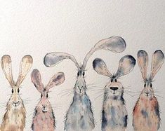 four rabbits are lined up in the same row and one is painted with watercolors