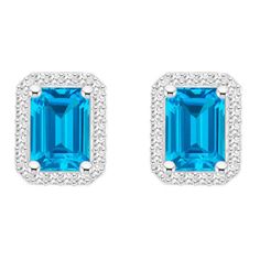 7x5mm emerald cut blue topaz 1/5 ctw diamond rhodium over sterling silver halo stud earrings. Measures approximately 0.38" L x 0.31" W and have post with friction backings. Diamond White Cubic Zirconia Jewelry With Gemstone Accents, Fine Jewelry Topaz With Halo Design, Fine Jewelry With Diamond Accents And Topaz, Elegant Topaz Jewelry With Halo Design, Formal Topaz Jewelry With Halo Setting, Emerald Cut Sterling Silver Jewelry With Diamond Accents, Classic Jewelry With Baguette Cut Gemstone Accents, Classic Baguette Cut Jewelry With Gemstone Accents, Silver Baguette Cut Birthstone Jewelry