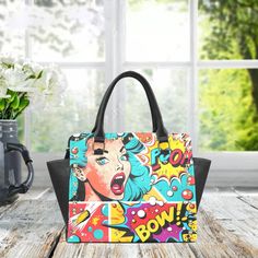 Ideal for fashion-forward individuals and creative trendsetters, this pop Art print handbag is perfect for adding a playful and eye-catching element to any outfit. Whether you're a professional, student, or simply love standing out, this unique accessory is designed for those with a confident and adventurous sense of style. 👜Rivet Shoulder Handbag with High-grade PU leather 👜Size:  11.22"(L) x 4.72"(W) x 9.84"(H), 👜All-Over Printing. 👜Lined interior features backwall zippered, large capacity Fun Rectangular Shoulder Bag As Gift, Fun Rectangular Shoulder Bag Gift, Artistic Rectangular Shoulder Bag With Artwork, Multicolor Bags With Graphic Print For Shopping, Multicolor Shopping Bags With Graphic Print, Trendy Bags With Graphic Print For Gifts, Trendy Bag With Graphic Print For Gift, Artsy Shoulder Bag Gift, Trendy Graphic Print Bag For Gifts