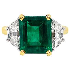 3.46 Carat Emerald and 1.56 Carat (total weight) Diamond Ring set in 18K Yellow Gold. Diamonds are set in Platinum. Emerald Cut Diamond Ring, Platinum Diamond Rings, Emerald Diamond Ring, Modern Engagement Rings, Diamond Ring Settings, Emerald Engagement, Three Stone Engagement Rings, Emerald Engagement Ring, Emerald Cut Diamonds