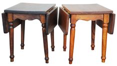 two small wooden tables sitting next to each other